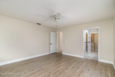 Nestled within a sought-after resort-style country club on Indian River Colony Club in Florida - for sale on GolfHomes.com, golf home, golf lot
