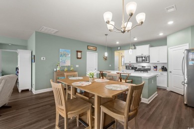 This thoughtfully designed home in The Retreat at Wild Wing on Wild Wing Plantation in South Carolina - for sale on GolfHomes.com, golf home, golf lot