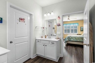 This thoughtfully designed home in The Retreat at Wild Wing on Wild Wing Plantation in South Carolina - for sale on GolfHomes.com, golf home, golf lot