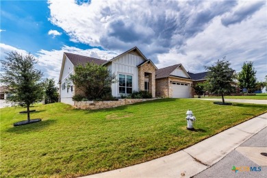 Experience serene contemporary living in the picturesque Kissing on Kissing Tree Golf Club in Texas - for sale on GolfHomes.com, golf home, golf lot