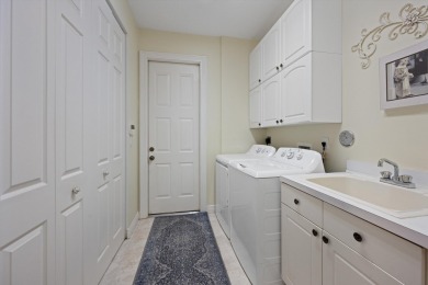 Spacious 5-bedroom, 3-bathroom pool home in the exclusive on The Wanderers Club in Florida - for sale on GolfHomes.com, golf home, golf lot