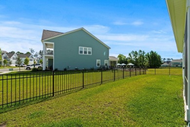 This thoughtfully designed home in The Retreat at Wild Wing on Wild Wing Plantation in South Carolina - for sale on GolfHomes.com, golf home, golf lot