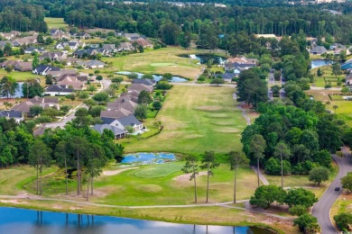 This thoughtfully designed home in The Retreat at Wild Wing on Wild Wing Plantation in South Carolina - for sale on GolfHomes.com, golf home, golf lot