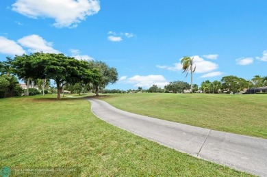 Welcome to this Spectacular Golf Course Pool Home making its on Weston Hills Country Club in Florida - for sale on GolfHomes.com, golf home, golf lot