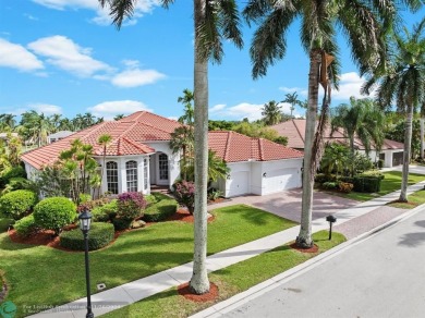 Welcome to this Spectacular Golf Course Pool Home making its on Weston Hills Country Club in Florida - for sale on GolfHomes.com, golf home, golf lot