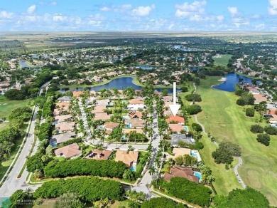 Welcome to this Spectacular Golf Course Pool Home making its on Weston Hills Country Club in Florida - for sale on GolfHomes.com, golf home, golf lot