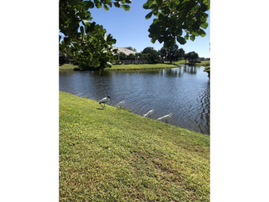 Spacious 5-bedroom, 3-bathroom pool home in the exclusive on The Wanderers Club in Florida - for sale on GolfHomes.com, golf home, golf lot