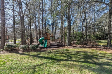 Nestled within coveted Preston Peninsula, this 4 bedroom home is on Prestonwood Country Club  in North Carolina - for sale on GolfHomes.com, golf home, golf lot