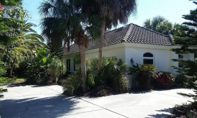 Listen to the waves crashing on the beach from this custom pool on Hammock Dunes Club in Florida - for sale on GolfHomes.com, golf home, golf lot