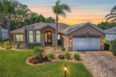 Welcome to your dream home nestled in a secluded oasis with on Eagle Ridge At Spruce Creek Country Club in Florida - for sale on GolfHomes.com, golf home, golf lot