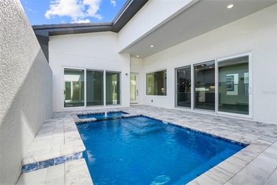 Beautiful 3 bedroom courtyard home with pool and spa located on Providence Golf Club in Florida - for sale on GolfHomes.com, golf home, golf lot