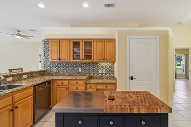 NEW ROOF, 2-stage AC unit, ductwork, HWH, storm windows, new on St. Lucie Trail Golf Club in Florida - for sale on GolfHomes.com, golf home, golf lot