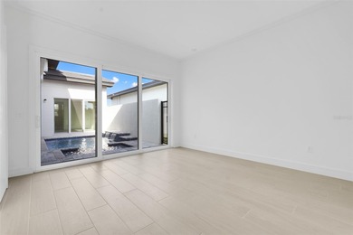 Beautiful 3 bedroom courtyard home with pool and spa located on Providence Golf Club in Florida - for sale on GolfHomes.com, golf home, golf lot