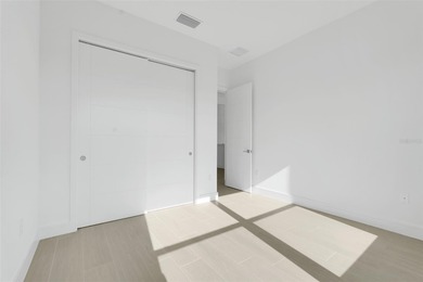 Beautiful 3 bedroom courtyard home with pool and spa located on Providence Golf Club in Florida - for sale on GolfHomes.com, golf home, golf lot