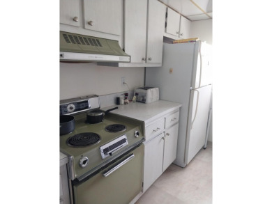 This 2/2 villa sits directly on the golf course which is free to on Leisureville Community Golf Course in Florida - for sale on GolfHomes.com, golf home, golf lot