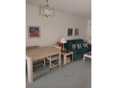 This 2/2 villa sits directly on the golf course which is free to on Leisureville Community Golf Course in Florida - for sale on GolfHomes.com, golf home, golf lot