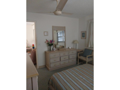 This 2/2 villa sits directly on the golf course which is free to on Leisureville Community Golf Course in Florida - for sale on GolfHomes.com, golf home, golf lot