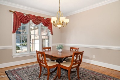 Custom-crafted and impeccably maintained, this stunning golf on River Landing Golf Course in North Carolina - for sale on GolfHomes.com, golf home, golf lot