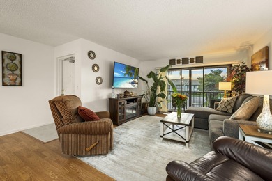 Move-in ready 3-bedroom, 2-bath second-floor condo in the gated on Monarch Country Club in Florida - for sale on GolfHomes.com, golf home, golf lot