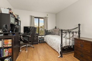 Move-in ready 3-bedroom, 2-bath second-floor condo in the gated on Monarch Country Club in Florida - for sale on GolfHomes.com, golf home, golf lot