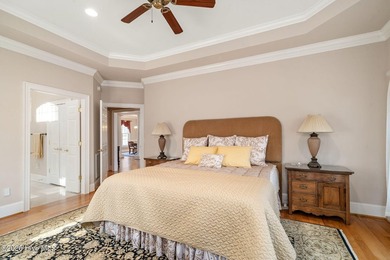 Custom-crafted and impeccably maintained, this stunning golf on River Landing Golf Course in North Carolina - for sale on GolfHomes.com, golf home, golf lot