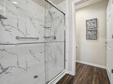 BEAUTIFULLY MAINTAINTED 2/2 MOONSTONE PATIO VILLA with separate on Pennbrooke Fairways in Florida - for sale on GolfHomes.com, golf home, golf lot