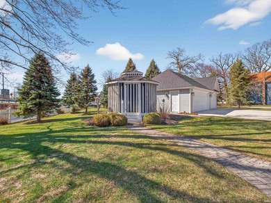 Turnkey luxury with extraordinary frontage on Syracuse Lake on Maxwelton Golf Club, Inc. in Indiana - for sale on GolfHomes.com, golf home, golf lot