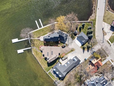 Turnkey luxury with extraordinary frontage on Syracuse Lake on Maxwelton Golf Club, Inc. in Indiana - for sale on GolfHomes.com, golf home, golf lot