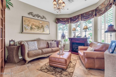 This stunning home offers a perfect blend of modern upgrades and on Lone Tree Golf Club in Arizona - for sale on GolfHomes.com, golf home, golf lot