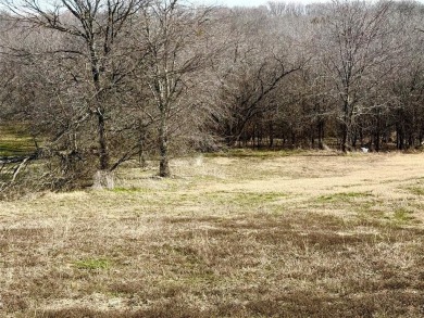 A Nature Lover's Paradise! Nestled in a serene and picturesque on Tangle Ridge Golf Club in Texas - for sale on GolfHomes.com, golf home, golf lot