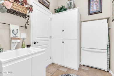 This stunning home offers a perfect blend of modern upgrades and on Lone Tree Golf Club in Arizona - for sale on GolfHomes.com, golf home, golf lot