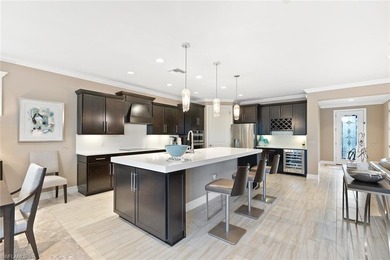 This home HAS IT ALL - GOLF MEMBERSHIP, BREATHTAKING WATER & on Panther Run Golf Club in Florida - for sale on GolfHomes.com, golf home, golf lot