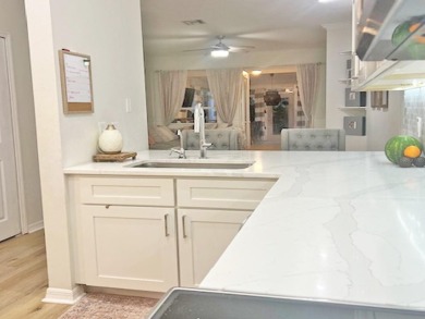 Location, size, space, and completely remodeled with on East Bay Golf Club in Florida - for sale on GolfHomes.com, golf home, golf lot