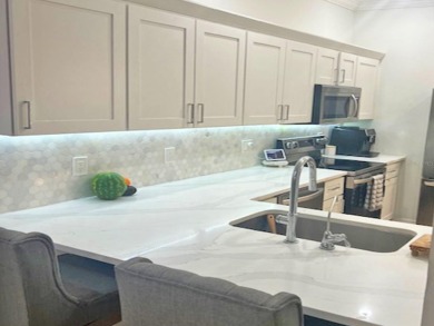 Location, size, space, and completely remodeled with on East Bay Golf Club in Florida - for sale on GolfHomes.com, golf home, golf lot