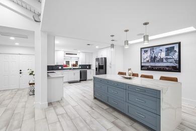 Welcome to this fully renovated 3-bedroom plus den, 2-bath on Boca Lago Golf and Country Club in Florida - for sale on GolfHomes.com, golf home, golf lot