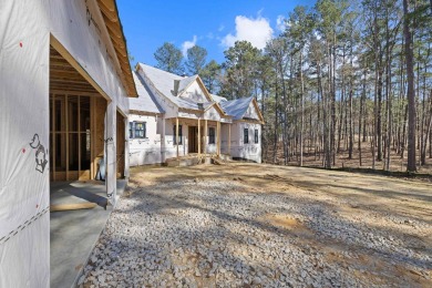 Discover the pinnacle of luxury living in this exceptional new on Reynolds Lake Oconee - The Oconee in Georgia - for sale on GolfHomes.com, golf home, golf lot