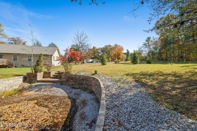 Welcome to your lakeside sanctuary on Lake Tansi's shores, a on Lake Tansi Village Country Club in Tennessee - for sale on GolfHomes.com, golf home, golf lot