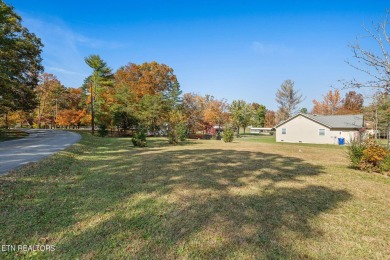 Welcome to your lakeside sanctuary on Lake Tansi's shores, a on Lake Tansi Village Country Club in Tennessee - for sale on GolfHomes.com, golf home, golf lot