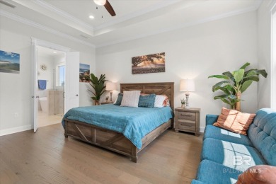 Tucked behind the gates of The Peninsula, one of Gulf Shores' on Peninsula Golf and Racquet Club in Alabama - for sale on GolfHomes.com, golf home, golf lot