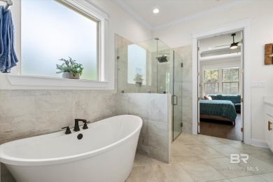 Tucked behind the gates of The Peninsula, one of Gulf Shores' on Peninsula Golf and Racquet Club in Alabama - for sale on GolfHomes.com, golf home, golf lot