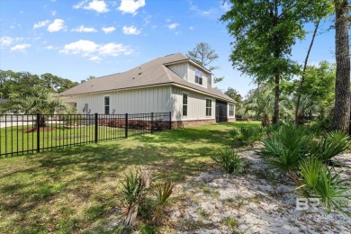 Tucked behind the gates of The Peninsula, one of Gulf Shores' on Peninsula Golf and Racquet Club in Alabama - for sale on GolfHomes.com, golf home, golf lot