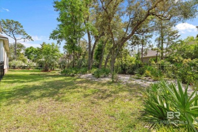 Tucked behind the gates of The Peninsula, one of Gulf Shores' on Peninsula Golf and Racquet Club in Alabama - for sale on GolfHomes.com, golf home, golf lot