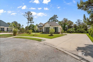 Tucked behind the gates of The Peninsula, one of Gulf Shores' on Peninsula Golf and Racquet Club in Alabama - for sale on GolfHomes.com, golf home, golf lot