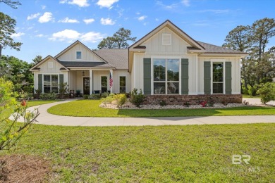 Tucked behind the gates of The Peninsula, one of Gulf Shores' on Peninsula Golf and Racquet Club in Alabama - for sale on GolfHomes.com, golf home, golf lot