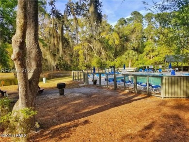 Enjoy the beach lifestyle in this charming one-level on Shipyard Golf Club in South Carolina - for sale on GolfHomes.com, golf home, golf lot