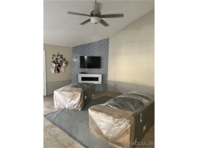 This 3-bedroom 2-bath home is nested in a quiet community in the on Plantation Inn and Golf Resort  in Florida - for sale on GolfHomes.com, golf home, golf lot