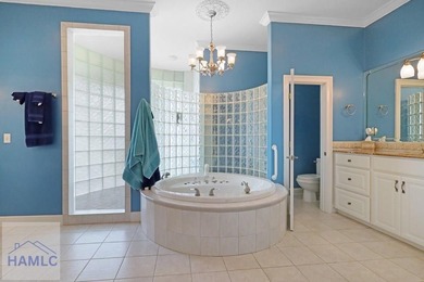 Welcome to this exquisite 4,400 sq ft custom stucco residence on Pine Forest Country Club in Georgia - for sale on GolfHomes.com, golf home, golf lot