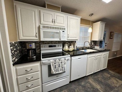 PRICE REDUCED ~ to $119,900. This spacious and meticulously on Four Lakes Golf Club in Florida - for sale on GolfHomes.com, golf home, golf lot