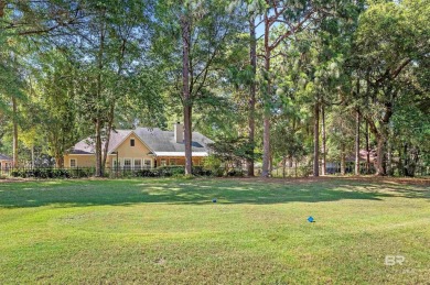 Golf Course Living in Lake Forest! Nestled on a tree-shaded lot on Lake Forest Yacht and Country Club in Alabama - for sale on GolfHomes.com, golf home, golf lot