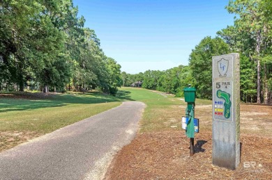 Golf Course Living in Lake Forest! Nestled on a tree-shaded lot on Lake Forest Yacht and Country Club in Alabama - for sale on GolfHomes.com, golf home, golf lot
